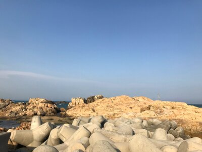 long exposure of sea and rocks photo