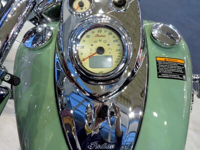 Metallic motorcycle reflection