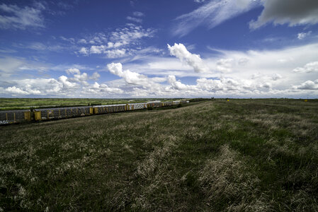 Train and landscape under the Beautiful Skies in Saskachewan