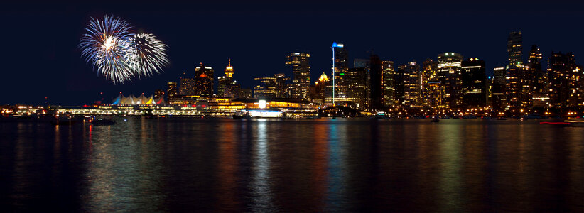 Skyline and fireworks at night in Vancouver, British Columbia, Canada photo