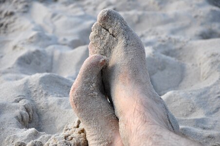 Feet in the sand relaxation rest photo