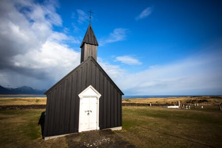 Black Chruch Building Blue Skies photo