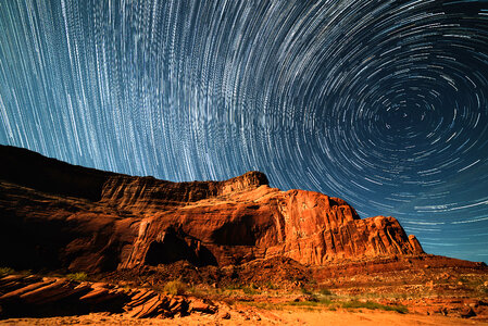 Star trails over the rocky landscape
