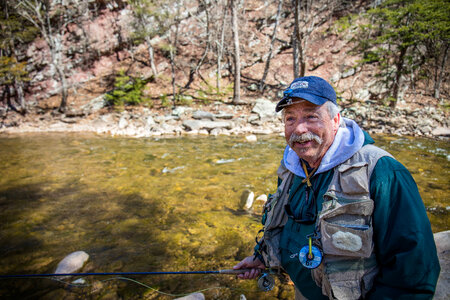 Fisherman fly fishing 