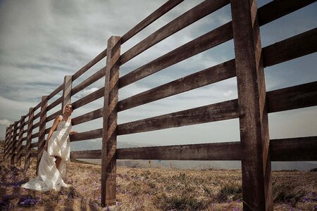 Countryside fence bride photo