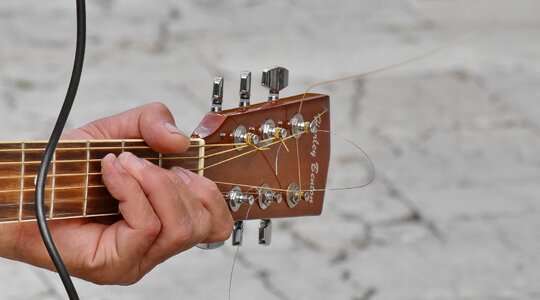 Acoustic finger guitarist photo