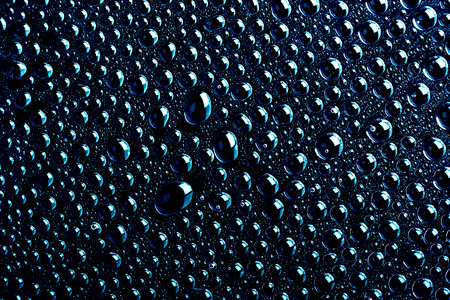 Deep blue water drops background photo