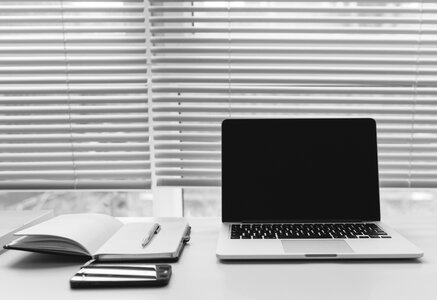 Black & White Laptop in Office photo
