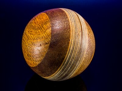 Wooden ball turned hand labor photo