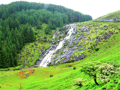 Waterfall on the hillside in Ireland