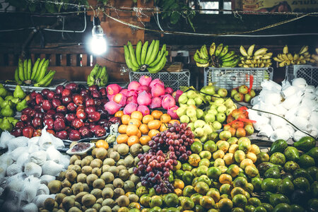 Variety of fresh fruits on organic food photo