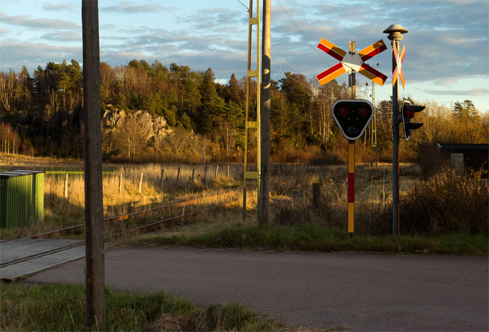 Evening creeping up on the old railroad crossing-cropped.gif