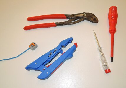 Voltage tester wire stripper pipe wrench
