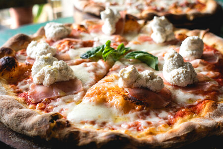 Pizza with ricotta cheese close up photo