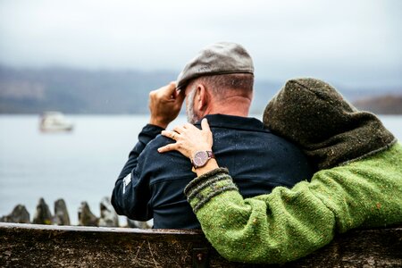 Couple Sits In British Rain photo