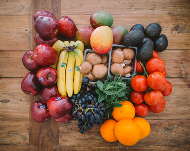 Fruits and Vegetables on Wood Table photo