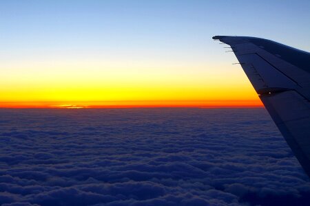 Wing airplane sunset photo