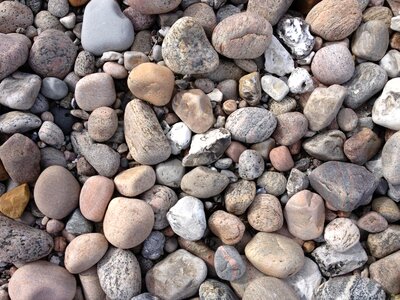 Sea pebbles round stone photo