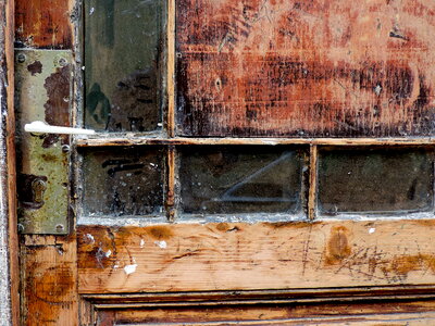 Abandoned dirty front door photo