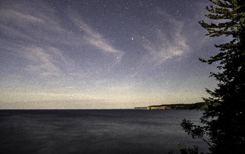 Stars above the night landscape at Pictured Rocks National Lakeshore, Michigan photo