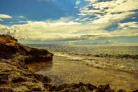 Beach cliff cloud photo