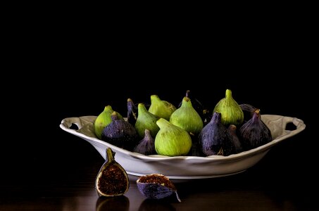 figs on a dark dish background. tinting. photo