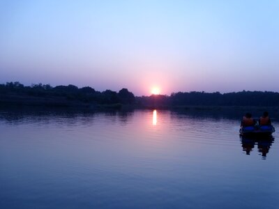 Boating dusk evening photo