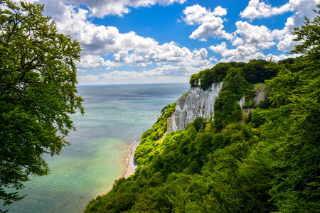 Cliffside with sky and clouds photo