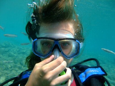 Woman diver scuba photo