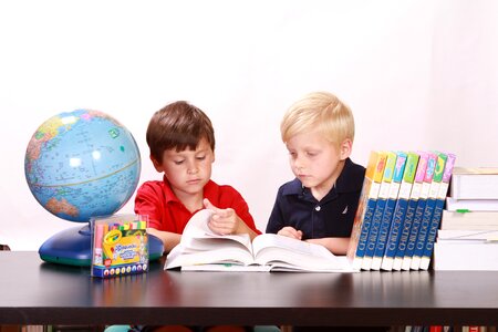 Boys reading books photo