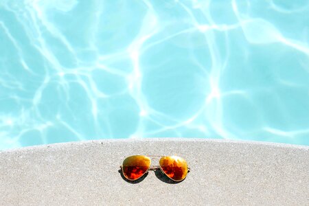 Summer Season sunglasses swimming pool photo