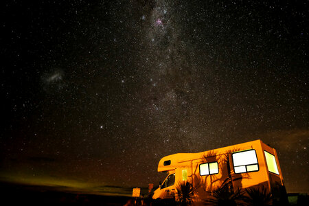 Stars and Milky Way above the trailer in Fortrose, New Zealand photo