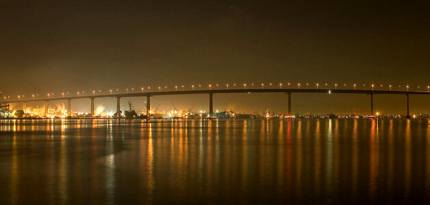 Bridge and skyline at night in San Diego, California photo