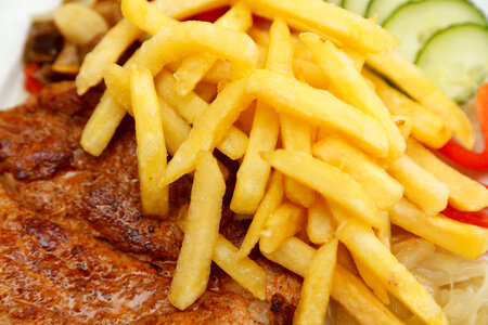 Fries over the steak
