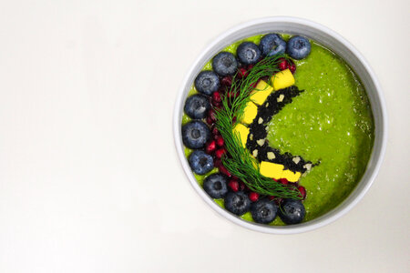 Green smoothie with blueberries photo