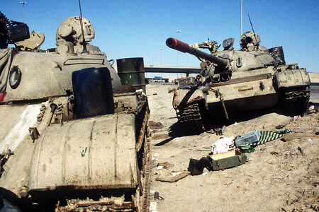 Two Iraqi tanks lie abandoned near Kuwait City in Gulf War photo