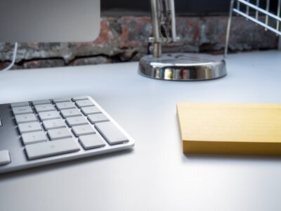 Office Desk with Keyboard and Notepad photo