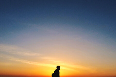 Man Silhouette at Sunset photo