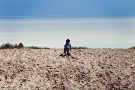 Child Crawling Sand photo