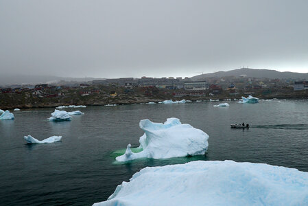 Boat among the Icebergs photo