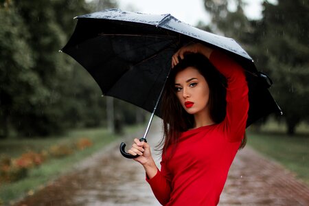 Woman Holding Umbrella photo