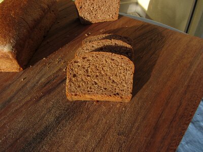 Cut homemade bread close up photo