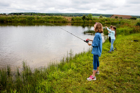 Young girls fishing photo