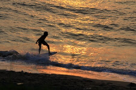 Surfer beach wave photo