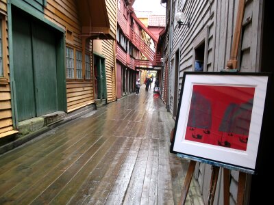 Street with old wooden houses in Bergen, Norway photo