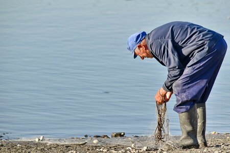 Elderly fisherman man photo