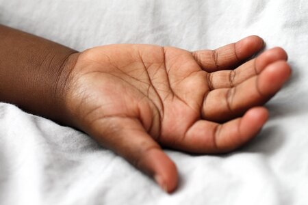 Hand black skin child