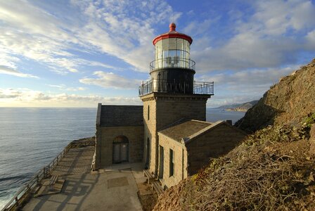 Clouds lighthouse architecture photo