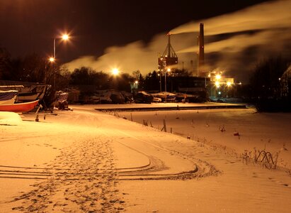 Winter landscape with factory chimneys and clouds photo