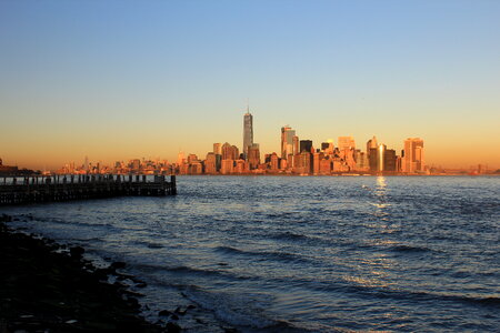 New York City, Sunset at Liberty Island, United States photo